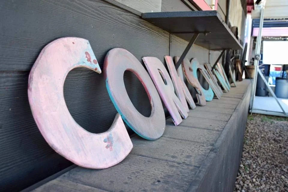 Dimensional CorkScrew lettering along the porch
